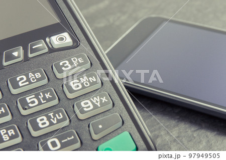 Payment terminal and smartphone with NFC technology using for cashless paying Payment terminal and smartphone with NFC technology using for cashless paying 97949505
