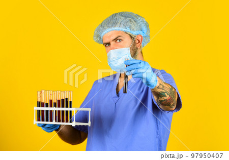 Laboratory Center Checks for blood test result. Feeling Unwell. man doctor work in hospital laboratory. Virus threat level. carrier of coronavirus. protective measures. coronavirus in China Laboratory Center Checks for blood test result. Feeling Unwell. man doctor work in hospital laboratory. Virus threat level. carrier of coronavirus. protective measures. coronavirus in China 97950407