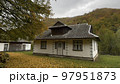 Old houses in the forest in autumn, Carpathian Ukraine 97951873