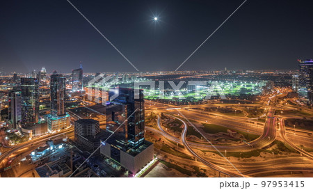 Panorama showing Dubai marina and JLT skyscrapers along Sheikh Zayed Road aerial night timelapse. Panorama showing Dubai marina and JLT skyscrapers along Sheikh Zayed Road aerial night timelapse. 97953415