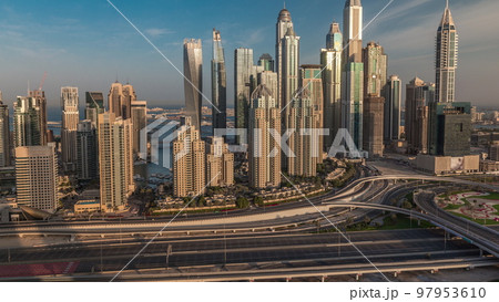 Dubai Marina highway intersection spaghetti junction morning timelapse 97953610