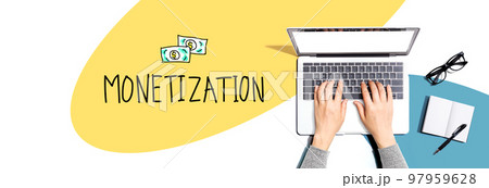 Monetization with person using a laptop Monetization with person using a laptop 97959628