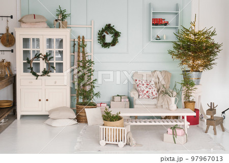 Cozy festive living room decorated for Christmas and New Year 97967013