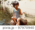 昭和50年代　水着を着て川遊びをする女の子 97970940