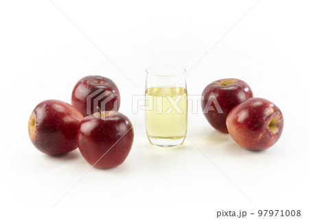 five apples and a glass of apple juice five apples and a glass of apple juice 97971008