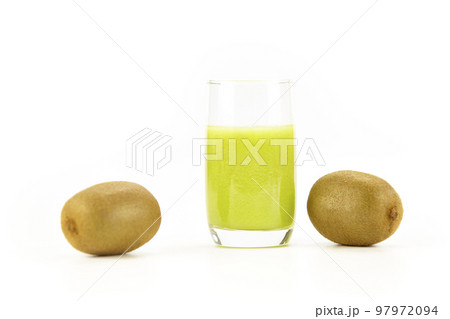 two kiwi fruits and a glass of kiwi juice two kiwi fruits and a glass of kiwi juice 97972094