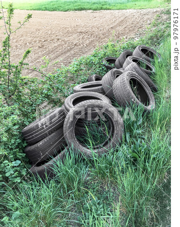 Old used car tires, abandoned Old used car tires, abandoned 97976171