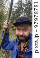 Man picking mushrooms in the forest in autumn, Carpathian Ukraine 97978781