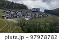 Small houses in the forest resort in autumn, Carpathian Ukraine 97978782