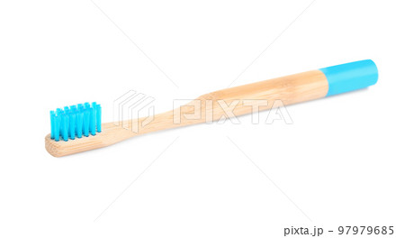 Bamboo toothbrush with blue bristle isolated on white Bamboo toothbrush with blue bristle isolated on white 97979685