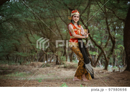 women presenting traditional Javanese dance movements women presenting traditional Javanese dance movements 97980698