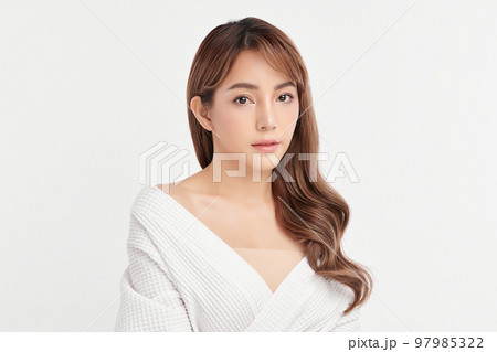 Beautiful young asian woman with clean fresh skin on white background, Face care, Facial treatment, Cosmetology, beauty and spa, Asian women portrait. Beautiful young asian woman with clean fresh skin on white background, Face care, Facial treatment, Cosmetology, beauty and spa, Asian women portrait. 97985322