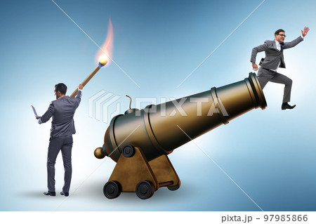 Concept of lay-off with businessman and cannon 97985866