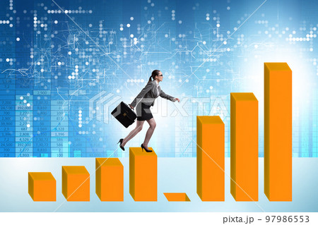 Businesswoman in growth concept with bar charts 97986553