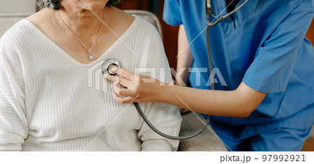 Senior woman being examined by a doctor 97992921