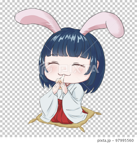 一個長著兔耳朵的女孩在墊子上吃麻糬 一個長著兔耳朵的女孩在墊子上吃麻糬 97995560