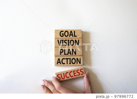 Goal Vision Plan Action Success symbol. Concept words Goal Vision Plan Action Success on wooden blocks. Beautiful white background. Businessman hand. Business concept. Copy space. Goal Vision Plan Action Success symbol. Concept words Goal Vision Plan Action Success on wooden blocks. Beautiful white background. Businessman hand. Business concept. Copy space. 97996772