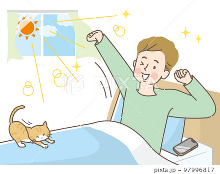 朝スッキリ目覚めて猫と一緒に伸びをする若い男性 97996817