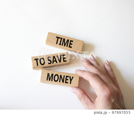 Time to save money symbol. Wooden blocks with words Time to save money. Businessman hand. Beautiful white background. Business and Time to save money concept. Copy space. 97997055