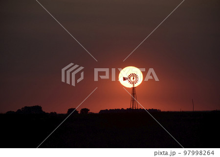 Windmill in countryside at sunset, Pampas, Patagonia,Argentina. Windmill in countryside at sunset, Pampas, Patagonia,Argentina. 97998264