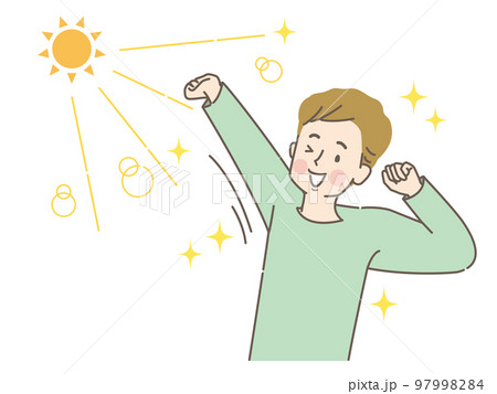 太陽の光を浴びながら伸びをする若い男性 97998284