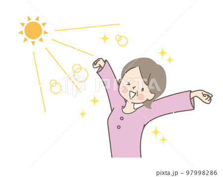 太陽の光を浴びながら伸びをするミドル女性 97998286