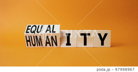 Equality and Humanity symbol. Turned cubes with words Equality and Humanity. Beautiful orange background. Business and Equality and Humanity concept. Copy space 97998967