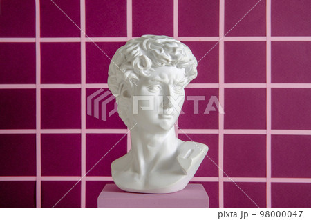 David antique statue on a pixel background as a minimal concept of digital  David antique statue on a pixel background as a minimal concept of digital  98000047