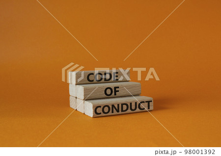 Code of conduct symbol. Wooden blocks with words Code of conduct. Beautiful orange background. Business and Code of conduct concept. Copy space. Code of conduct symbol. Wooden blocks with words Code of conduct. Beautiful orange background. Business and Code of conduct concept. Copy space. 98001392