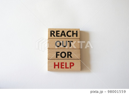 Reach out for help symbol. Wooden blocks with words Reach out for help. Beautiful white background. Business and Reach out for help concept. Copy space. 98001559