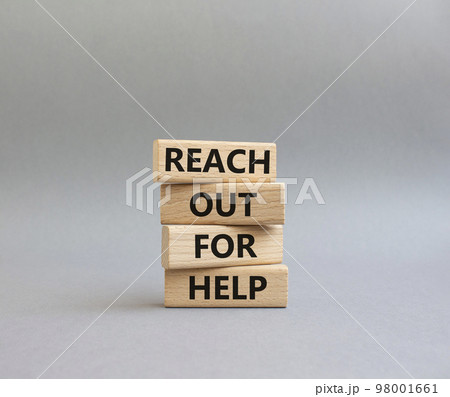 Reach out for help symbol. Wooden blocks with words Reach out for help. Beautiful grey background. Business and Reach out for help concept. Copy space. Reach out for help symbol. Wooden blocks with words Reach out for help. Beautiful grey background. Business and Reach out for help concept. Copy space. 98001661