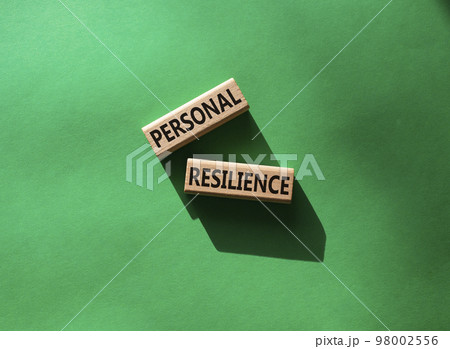 Personal resilience symbol. Wooden blocks with words Personal resilience. Beautiful green background. Business and Personal resilience concept. Copy space. Personal resilience symbol. Wooden blocks with words Personal resilience. Beautiful green background. Business and Personal resilience concept. Copy space. 98002556