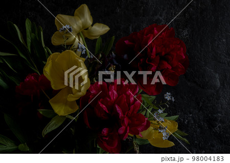 luxury bouquet dark red peonies and other spring flowers on a black luxury bouquet dark red peonies and other spring flowers on a black 98004183