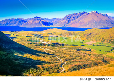 Above Queenstown and Lake Wakatipu in south Island, New Zealand at sunset Above Queenstown and Lake Wakatipu in south Island, New Zealand at sunset 98009427