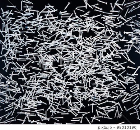 Screwdriver Nail fly floating in mid air. Many group screw nails short long metal fall as construction tools. Black background isolated. New Screwdriver Nail fall down unbox steel hardware work Screwdriver Nail fly floating in mid air. Many group screw nails short long metal fall as construction tools. Black background isolated. New Screwdriver Nail fall down unbox steel hardware work 98010190