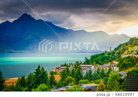 Above Queenstown and Lake Wakatipu in south Island, New Zealand at sunset 98010997