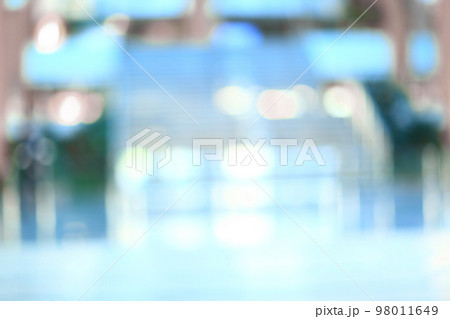 blurry image of an empty lobby of a modern hotel . blurry image of an empty lobby of a modern hotel . 98011649