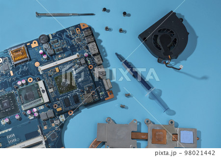 disassembled laptop computer board during repair 98021442