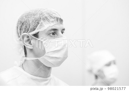 black surgical mask with white inside