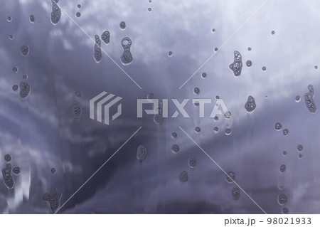 Natural soap foam on glass 98021933