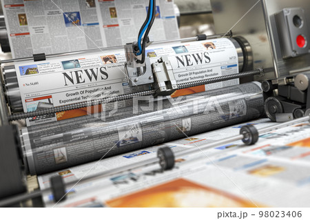 Newspaper or hournal with news printing on a printing machine in a typography. 98023406