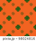 Seamless vector pattern with clover leaves. The holidays backdrop for St. Patrick's Day. Colorful elements on the orange. Festive background for greeting cards, decoration, packaging design, and web. 98024816