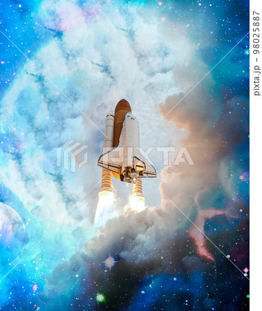 Shuttle launch in the clouds to outer space. Dark space with stars on background.Spaceship flight. Elements of this image furnished by NASA 98025887