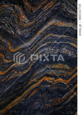 Rocky shapes on the beach. textures and patterns generated on the stones of the Asturian beaches 98030759