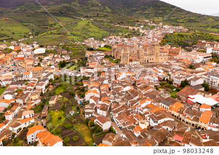 Drone view of Guadalupe with residential buildings and medieval Monastery Drone view of Guadalupe with residential buildings and medieval Monastery 98033248