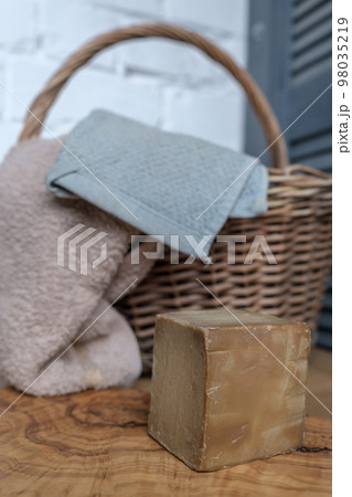 Close-up of handmade soap on a wooden table, handmade soap making, olive soap, selective focus 98035219