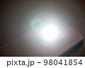 LED Flash or Flashlight of a Smartphone on black background 98041854