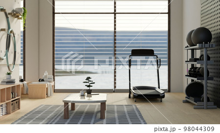 Modern home exercise room interior with treadmill running machine, sport equipments and decors Modern home exercise room interior with treadmill running machine, sport equipments and decors 98044309