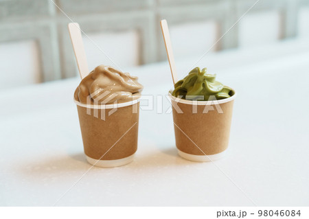 green tea and coffee ice cream paper cup in cafe green tea and coffee ice cream paper cup in cafe 98046084