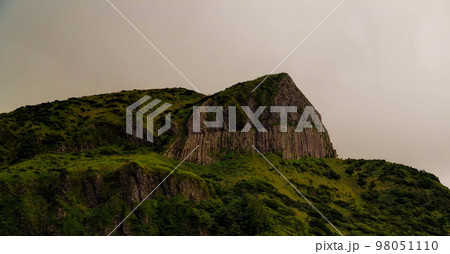 panoramic view to Rocha dos Bordoes aka Catchphrases cliff at Flores, Azores, Portugal panoramic view to Rocha dos Bordoes aka Catchphrases cliff at Flores, Azores, Portugal 98051110